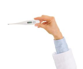 Closeup on doctor hand holding thermometer