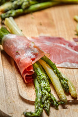 Closeup of asparagus and prosciutto