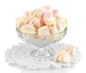 Gentle marshmallow in glass vase isolated on white