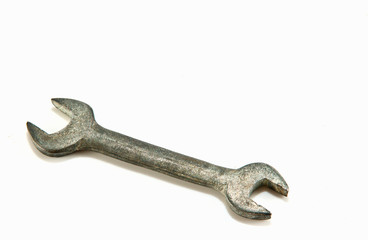 Old  wrench on white background