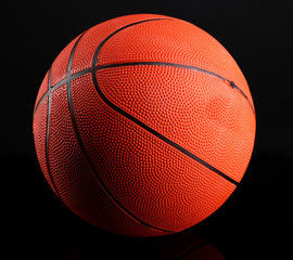 Fototapeta premium Basketball on black background