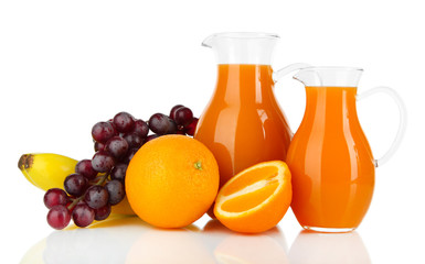 Orange juice in pitchers isolated on white