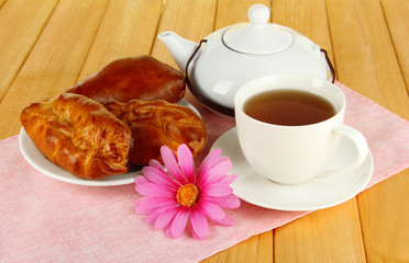 Cherry Pie with tea on table close-up