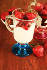 Delicious strawberry desserts in glass vase