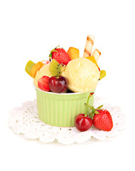 Delicious  ice cream with fruits and berries in bowl isolated