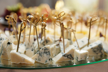 Variety of cheese on banquet table