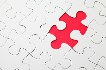 Missing puzzle piece in red