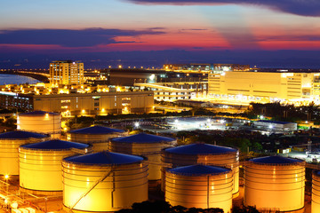 Oil tank in cargo service terminal at night