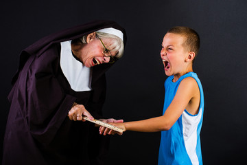 nun hitting a boy