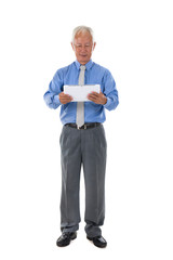 senior chinese singaporean with a tablet business man isolated o