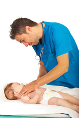 Obraz na płótnie Canvas Pediatrician examine baby