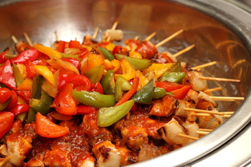 Barbecued sausage with tomato sauce