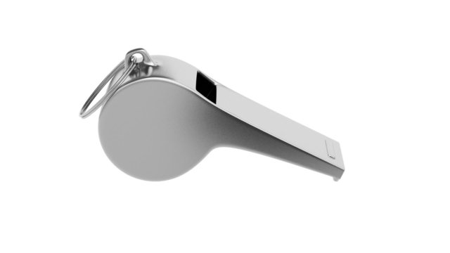 Metal whistle rotates on white background