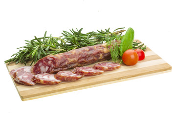 Salami with rosemary, basil and tomato
