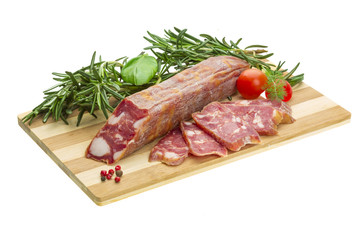 Salami with rosemary, basil and tomato