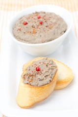 liver pate with pink pepper on toasted bread