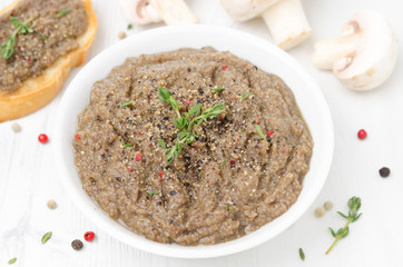 mushroom pate in a bowl close-up top view