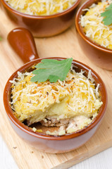 portioned form with baked chicken with mashed cauliflower