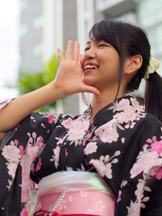 Young woman in Japanese kimono style shouting