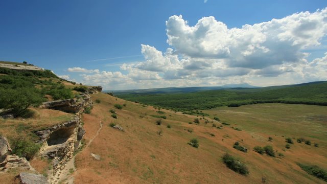 Movement of the clouds on the mountain. Cave city Bakla, Crimea,