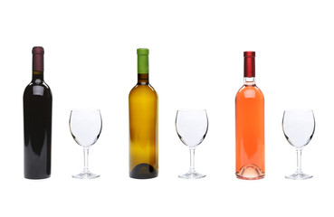 Red, rose, white wine bottles and glasses