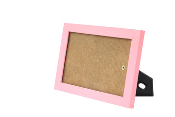 Empty pink picture frame or border with stand isolated on white
