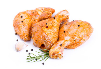 Raw chicken legs and wings