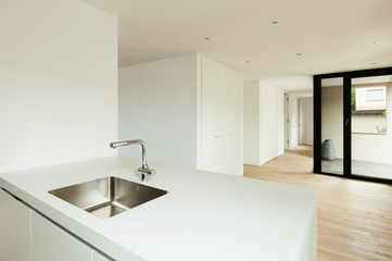 Fototapeta na wymiar interior new house, modern white kitchen