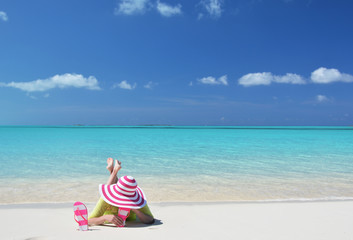 Fototapeta na wymiar Girl on the beach of Exuma, Bahamas
