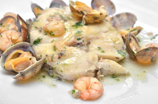 Merluza en salsa verde