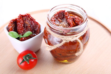 Sun dried tomatoes with olive oil in a jar