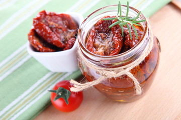 Sun dried tomatoes with olive oil in a jar