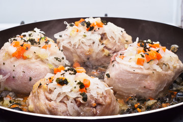 veal shank cooking in pan
