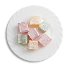 Turkish delight on a plate isolated