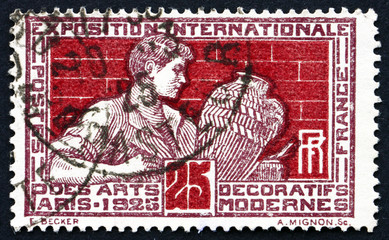 Postage stamp France 1924 shows Potter Decorating Vase