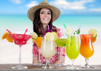 Portrait of a beautiful young girl with cocktail