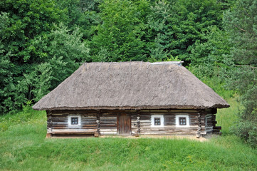 Plakat Ancient traditional ukrainian rural cottage with a straw roof