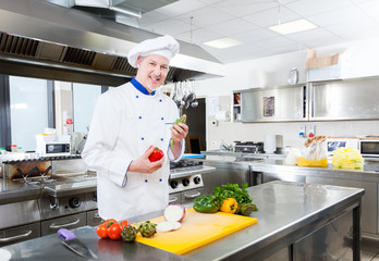 Chef cooking in his kitchen