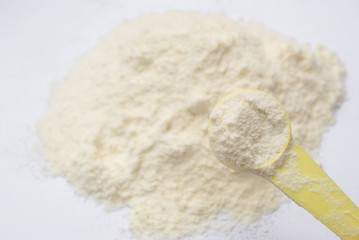 powder milk and yellow spoon