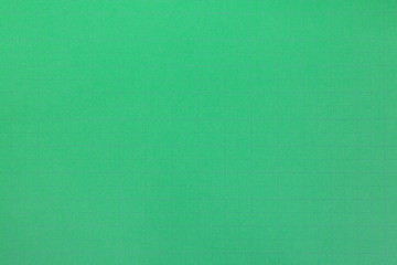 Green paper background with cutting line