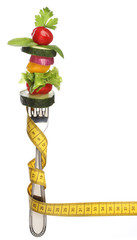 Mixed vegetables on a fork isolated. Diet concept