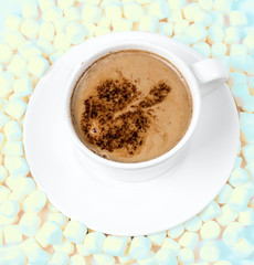 Hot chocolate in white Cup powdered cocoa with colored marchmall