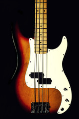 Fototapeta na wymiar bass guitar on a black background