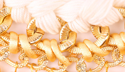 Golden pearls with macrame