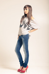 woman wearing jeans and t-shirt with an inscription love