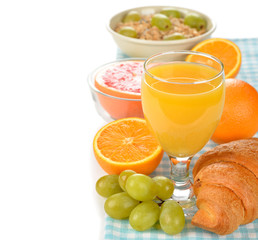 Orange juice, grapes and  croissant