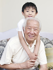 grandpa and grandson having fun at home