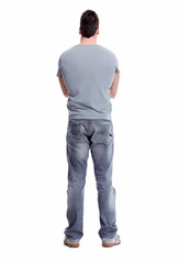 Fototapeta premium Young man looking the wall.