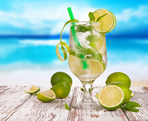 Summer drink with blur beach on background