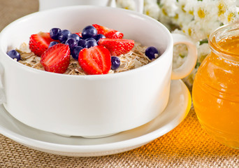 Oatmeal with strawberries and blueberries